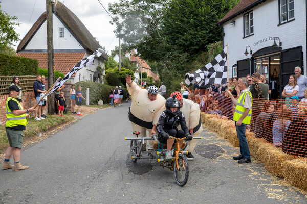 Great Cheverell Soapbox Derby Finish Line in 2022 looking up the high street